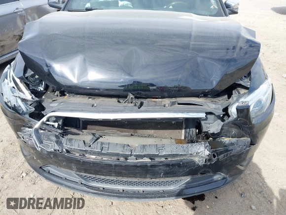 2016 Ford Taurus Limited with VIN 1FAHP2F8XGG130950, listed as a IAAI auction lot 41833038 with 128,536 mi miles and . Bid and sale history available at DreamBid. Image 6.