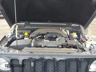 2021 Jeep Wrangler Unlimited Willys with VIN 1C4HJXDGXMW763324, listed as a IAAI auction lot 41643296 with 22,599 mi miles and . Bid and sale history available at DreamBid. Image 10.