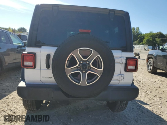 2022 Jeep Wrangler Unlimited High Tide with VIN 1C4HJXDG9NW132131, listed as a Copart auction lot 69314354 with 33,711 mi miles and Salvage Title. Bid and sale history available at DreamBid. Image 6.