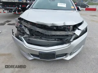 2014 Chevrolet Impala LT with VIN 2G1125S39E9313542, listed as a IAAI auction lot 41988420 with 227,093 mi miles and . Bid and sale history available at DreamBid. Image 6.