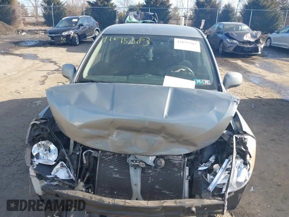 2011 Nissan Versa S z VIN 3N1BC1CP5BL517754, wystawiony jako IAAI lot #41675383 z przebiegiem 125 000 mil mil oraz . Historia ofert i sprzedaży dostępna na DreamBid. Obrazek 13.
