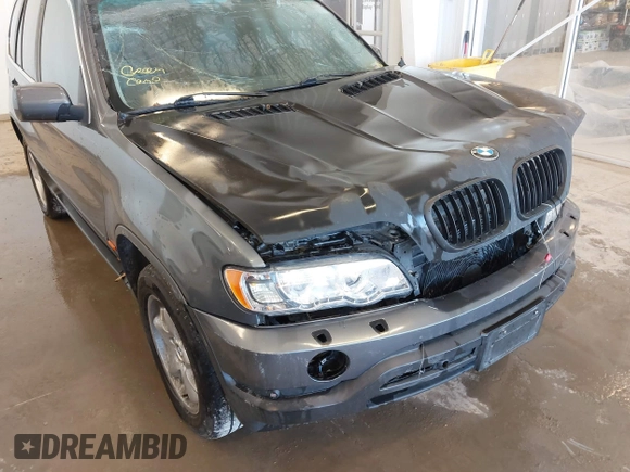 2003 BMW X5 4.4i with VIN 5UXFB33573LH46415, listed as a IAAI auction lot 41442213 with 145,290 mi miles. Bid and sale history available at carsss.com. Image 12.