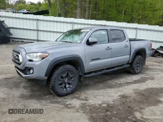 2021 Toyota Tacoma SR with VIN 5TFCZ5AN5MX283034, listed as a Copart auction lot 56645455 with 88,360 mi miles and Salvage title. Bid and sale history available at DreamBid. Image 1.