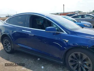 2018 Tesla Model X 75D with VIN 5YJXCAE21JF132628, listed as a IAAI auction lot 42081282 with 35,360 mi miles and . Bid and sale history available at carsss.com. Image 13.