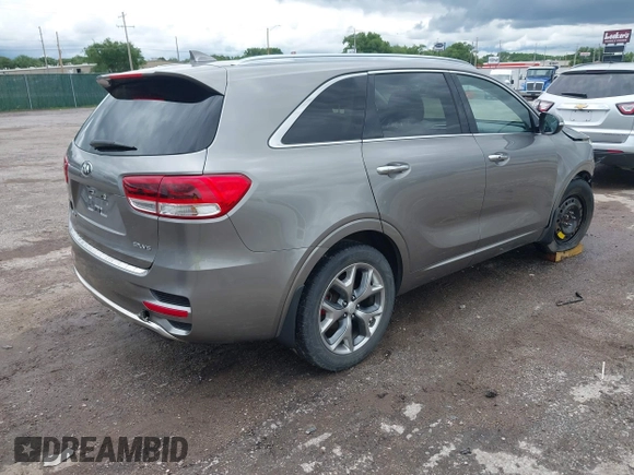2017 Kia Sorento SXL z VIN 5XYPK4A59HG253995, wystawiony jako IAAI lot #42367134 z przebiegiem 118 084 mil mil oraz . Historia ofert i sprzedaży dostępna na DreamBid. Obrazek 4.
