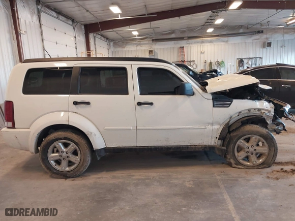 2008 Dodge Nitro SXT with VIN 1D8GU28K48W272971, listed as a IAAI auction lot 41774435 with 225,071 mi miles. Bid and sale history available at carsss.com. Image 13.