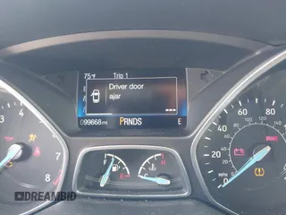 2015 Ford Focus SE with VIN 1FADP3F25FL348929, listed as a IAAI auction lot 42275725 with 99,668 mi miles and . Bid and sale history available at DreamBid. Image 7.