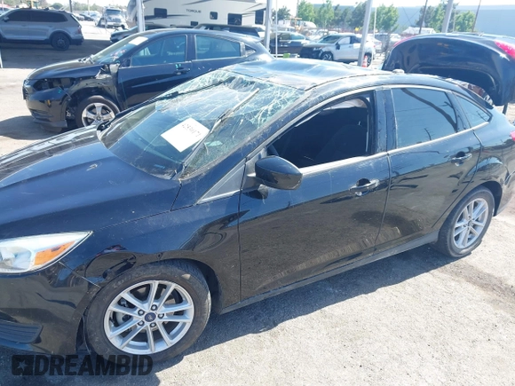 2018 Ford Focus SE z VIN 1FADP3FE9JL303933, wystawiony jako IAAI lot #42530171 z przebiegiem Nie podano mil oraz . Historia ofert i sprzedaży dostępna na DreamBid. Obrazek 6.