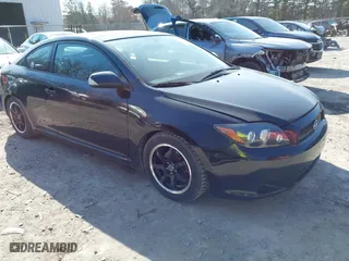2009 Scion tC with VIN JTKDE167390300957, listed as a IAAI auction lot 42102405 with 91,768 mi miles. Bid and sale history available at carsss.com. Image 1.