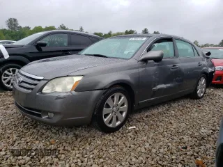 2006 Toyota Avalon XL z VIN 4T1BK36BX6U106255, wystawiony jako Copart lot #57944185 z przebiegiem 104 961 mil mil oraz Czysty tytuł • Clean title. Historia ofert i sprzedaży dostępna na DreamBid. Obrazek 1.