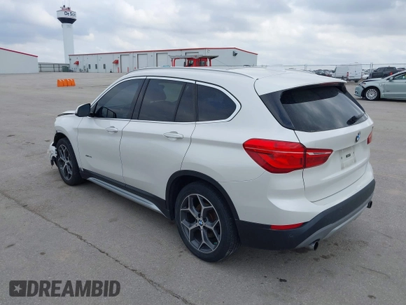 2016 BMW X1 xDrive28i with VIN WBXHT3C35GP886144, listed as a IAAI auction lot 41954742 with 89,268 mi miles. Bid and sale history available at carsss.com. Image 3.