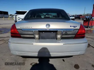 2009 Mercury Grand Marquis LS with VIN 2MEHM75V09X619313, listed as a Copart auction lot 41596455 with 198,017 mi miles and Salvage Title. Bid and sale history available at DreamBid. Image 6.