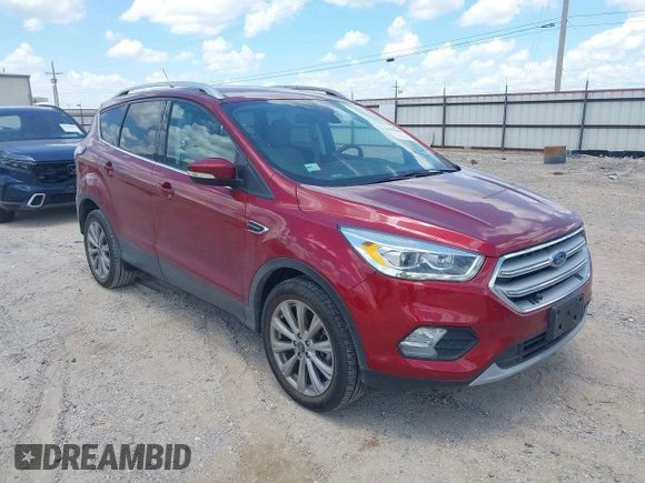 2018 Ford Escape Titanium with VIN 1FMCU0J96JUD58854, listed as a IAAI auction lot 42590609 with 77,825 mi miles and . Bid and sale history available at DreamBid. Image 1.