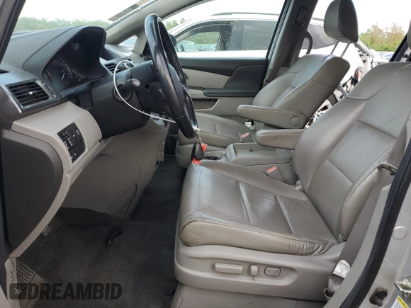 2014 Honda Odyssey Touring with VIN 5FNRL5H93EB034263, listed as a Copart auction lot 57254485 with 150,084 mi miles and Salvage title. Bid and sale history available at DreamBid. Image 7.