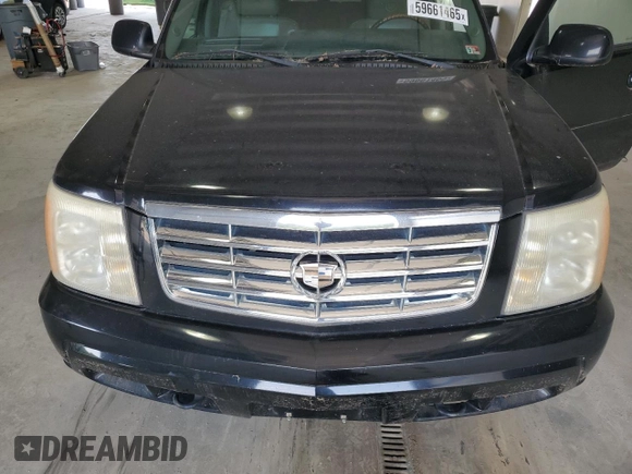 2006 Cadillac Escalade z VIN 1GYEK63N56R139033, wystawiony jako Copart lot #59661465 z przebiegiem Nie podano mil oraz Czysty tytuł • Clean title. Historia ofert i sprzedaży dostępna na DreamBid. Obrazek 12.