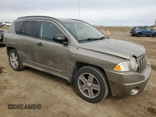 2008 Jeep Compass Sport with VIN 1J8FF47W68D639328, listed as a Copart auction lot 50756395 with 242,557 mi miles and Salvage Title. Bid and sale history available at carsss.com. Image 4.