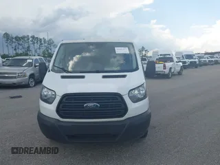 2019 Ford Transit with VIN 1FTYE1ZM3KKB46285, listed as a IAAI auction lot 42495117 with 234,622 mi miles and . Bid and sale history available at DreamBid. Image 12.