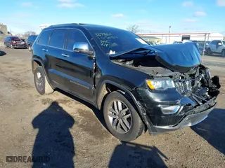 2021 Jeep Grand Cherokee Limited with VIN 1C4RJFBG0MC563846, listed as a IAAI auction lot 41034617 with 59,820 mi miles. Bid and sale history available at carsss.com. Image 1.