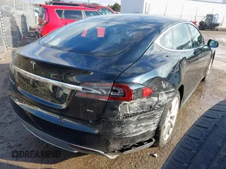 2016 Tesla Model S 70 with VIN 5YJSA1E11GF124965, listed as a IAAI auction lot 41458132 with Not provided miles and . Bid and sale history available at DreamBid. Image 4.