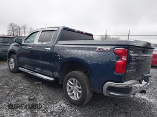 2022 Chevrolet Silverado 1500 LT with VIN 1GCUDDET0NZ597606, listed as a IAAI auction lot 40943441 with 32,673 mi miles and . Bid and sale history available at DreamBid. Image 3.