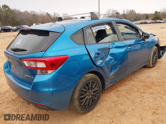 2019 Subaru Impreza with VIN 4S3GTAA64K3718084, listed as a IAAI auction lot 41726910 with 56,523 mi miles and . Bid and sale history available at DreamBid. Image 4.