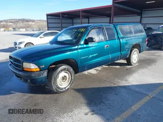 1997 Dodge Dakota with VIN 1B7GL23X8VS124300, listed as a IAAI auction lot 41561541 with 170,248 mi miles. Bid and sale history available at carsss.com. Image 2.