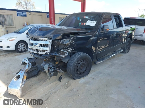 2014 Ford F-150 XL with VIN 1FTFW1CF1EFA41871, listed as a IAAI auction lot 42060338 with 134,591 mi miles. Bid and sale history available at carsss.com. Image 2.