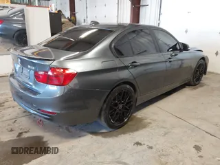 2015 BMW 3 Series 328i xDrive with VIN WBA3B5G53FNS17413, listed as a IAAI auction lot 41643479 with 99,065 mi miles. Bid and sale history available at carsss.com. Image 4.