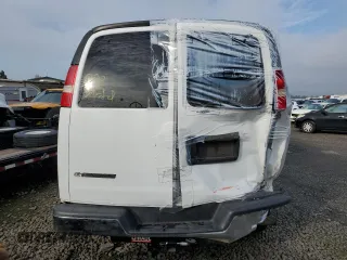 2018 Chevrolet Express Passenger LT with VIN 1GAZGPFG3J1245055, listed as a Copart auction lot 87807965 with 106,634 mi miles and Salvage title. Bid and sale history available at DreamBid. Image 6.