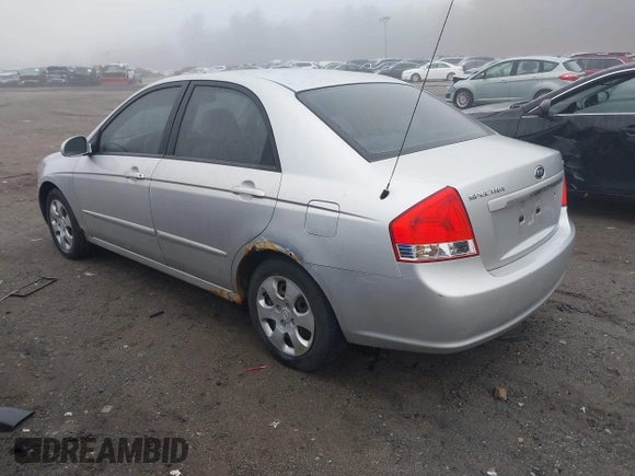 2008 Kia Spectra EX with VIN KNAFE122885522404, listed as a IAAI auction lot 41918687 with 127,060 mi miles. Bid and sale history available at carsss.com. Image 3.