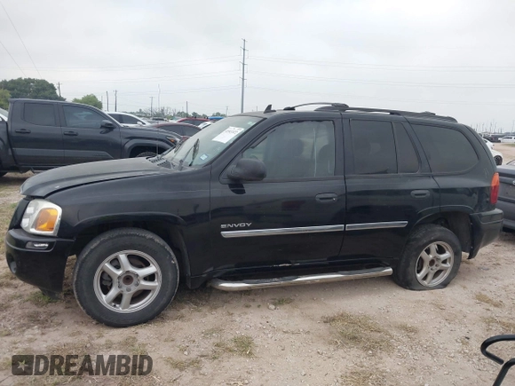 2006 GMC Envoy SLT with VIN 1GKDS13S462241866, listed as a IAAI auction lot 41943322 with 90,695 mi miles. Bid and sale history available at carsss.com. Image 14.