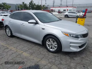 2016 Kia Optima LX with VIN KNAGT4L3XG5111796, listed as a IAAI auction lot 42106116 with 138,184 mi miles. Bid and sale history available at carsss.com. Image 1.