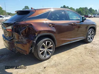 2016 Lexus RX 350 with VIN 2T2ZZMCA3GC005018, listed as a IAAI auction lot 42276197 with 136,692 mi miles and . Bid and sale history available at DreamBid. Image 4.