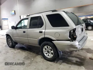 2004 Isuzu Rodeo S z VIN 4S2CK58W144306785, wystawiony jako Copart lot #85124684 z przebiegiem 296 433 mil mil oraz Szkody całkowita. Historia ofert i sprzedaży dostępna na DreamBid. Obrazek 2.