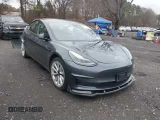 2022 Tesla Model 3 with VIN 5YJ3E1EA6NF143839, listed as a IAAI auction lot 40905007 with 83,897 mi miles and . Bid and sale history available at DreamBid. Image 1.