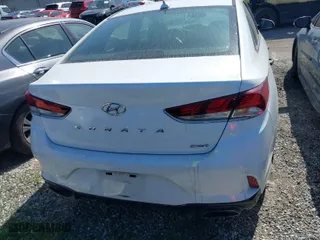 2019 Hyundai Sonata Sport with VIN 5NPE34AF1KH820438, listed as a IAAI auction lot 41353422 with 56,603 mi miles. Bid and sale history available at carsss.com. Image 16.