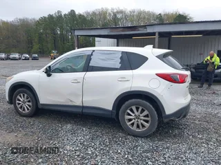2015 Mazda CX-5 Touring with VIN JM3KE2CY4F0436664, listed as a IAAI auction lot 41876238 with 374,305 mi miles. Bid and sale history available at carsss.com. Image 14.