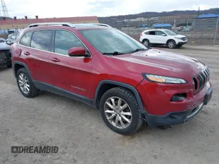 2014 Jeep Cherokee Limited with VIN 1C4PJMDB5EW219457, listed as a IAAI auction lot 41768074 with 124,195 mi miles. Bid and sale history available at carsss.com. Image 1.