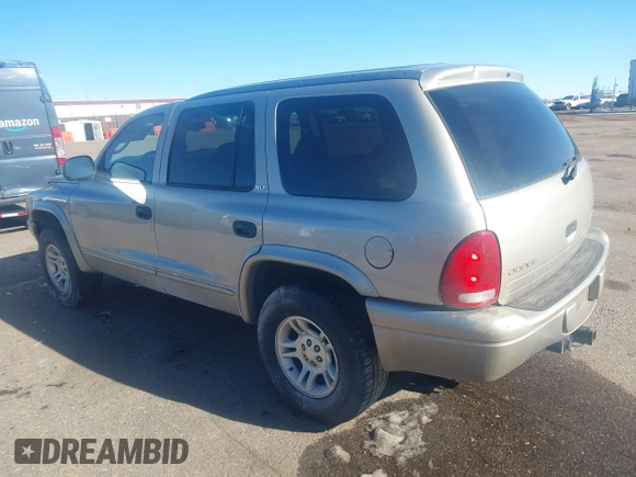 2002 Dodge Durango SLT with VIN 1B4HS48N12F160504, listed as a IAAI auction lot 41304610 with 179,724 mi miles and . Bid and sale history available at DreamBid. Image 3.