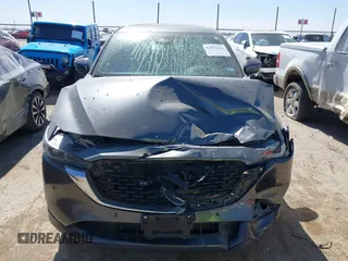 2023 Mazda CX-5 Signature with VIN JM3KFBXY8P0101156, listed as a IAAI auction lot 41670424 with Not Provided miles and . Bid and sale history available at carsss.com. Image 11.