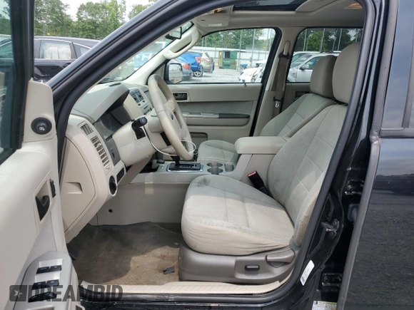 2010 Ford Escape Hybrid with VIN 1FMCU4K32AKB40357, listed as a Copart auction lot 59500025 with 169,955 mi miles and Salvage title. Bid and sale history available at DreamBid. Image 7.