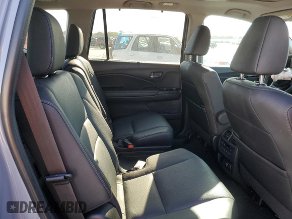 2022 Honda Pilot Elite z VIN 5FNYF6H0XNB060420, wystawiony jako Copart lot #50035415 z przebiegiem 37 288 mil mil oraz Szkoda całkowita • Salvage title. Historia ofert i sprzedaży dostępna na DreamBid. Obrazek 11.