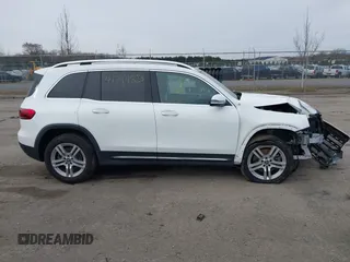2022 Mercedes-Benz GLB 250 z VIN W1N4M4HB7NW173675, wystawiony jako IAAI lot #41744858 z przebiegiem 20 909 mil mil oraz . Historia ofert i sprzedaży dostępna na DreamBid. Obrazek 14.
