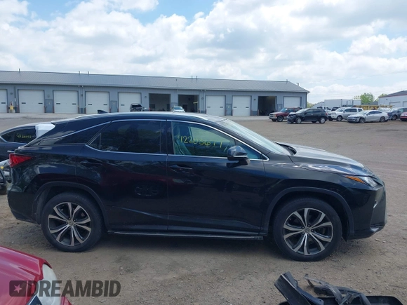 2017 Lexus RX 350 with VIN 2T2BZMCA8HC066061, listed as a IAAI auction lot 42203677 with 165,618 mi miles and . Bid and sale history available at DreamBid. Image 13.