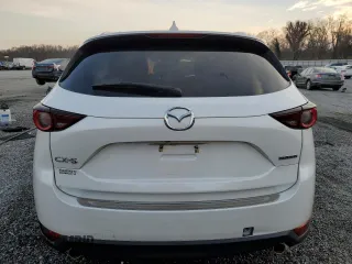 2020 Mazda CX-5 Touring with VIN JM3KFACM0L0863937, listed as a Copart auction lot 48240655 with 70,592 mi miles and Salvage Title. Bid and sale history available at carsss.com. Image 6.