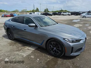 2024 BMW i4 eDrive40 z VIN WBY73AW0XRFS98892, wystawiony jako Copart lot #56057495 z przebiegiem 24 943 mil mil oraz Tytuł czysty. Historia ofert i sprzedaży dostępna na DreamBid. Obrazek 4.
