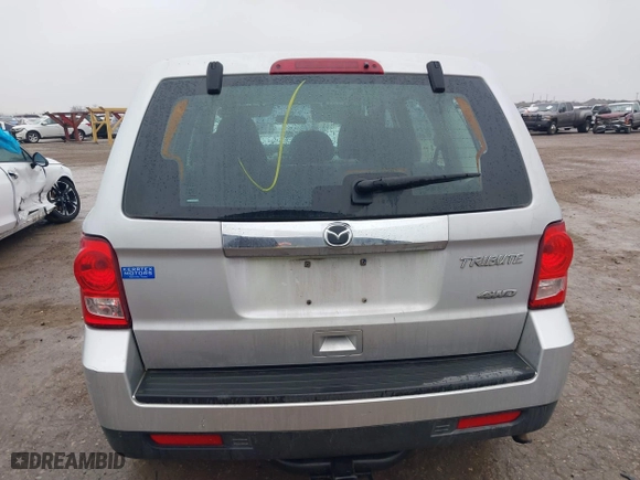 2011 Mazda Tribute Sport with VIN 4F2CY9C7XBKM01050, listed as a IAAI auction lot 41433870 with 122,287 mi miles. Bid and sale history available at carsss.com. Image 16.