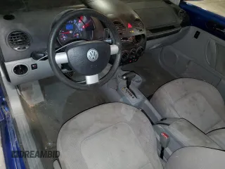 2004 Volkswagen New Beetle Coupe GLS with VIN 3VWCK31C34M422989, listed as a Copart auction lot 77594674 with 212,116 mi miles and Salvage Title. Bid and sale history available at carsss.com. Image 8.