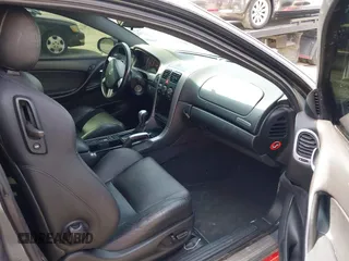 2005 Pontiac GTO with VIN 6G2VX12UX5L407635, listed as a IAAI auction lot 41768211 with 82,365 mi miles. Bid and sale history available at carsss.com. Image 5.