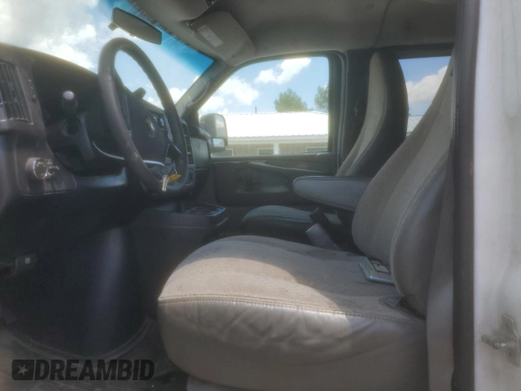 2012 Chevrolet Express Passenger 1LT z VIN 1GAZG1FG6C1144110, wystawiony jako Copart lot #56135025 z przebiegiem 145 093 mil mil oraz Szkoda całkowita • Salvage title. Historia ofert i sprzedaży dostępna na DreamBid. Obrazek 7.